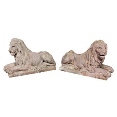 Pair of French Terracotta Figures of Crouching Lions