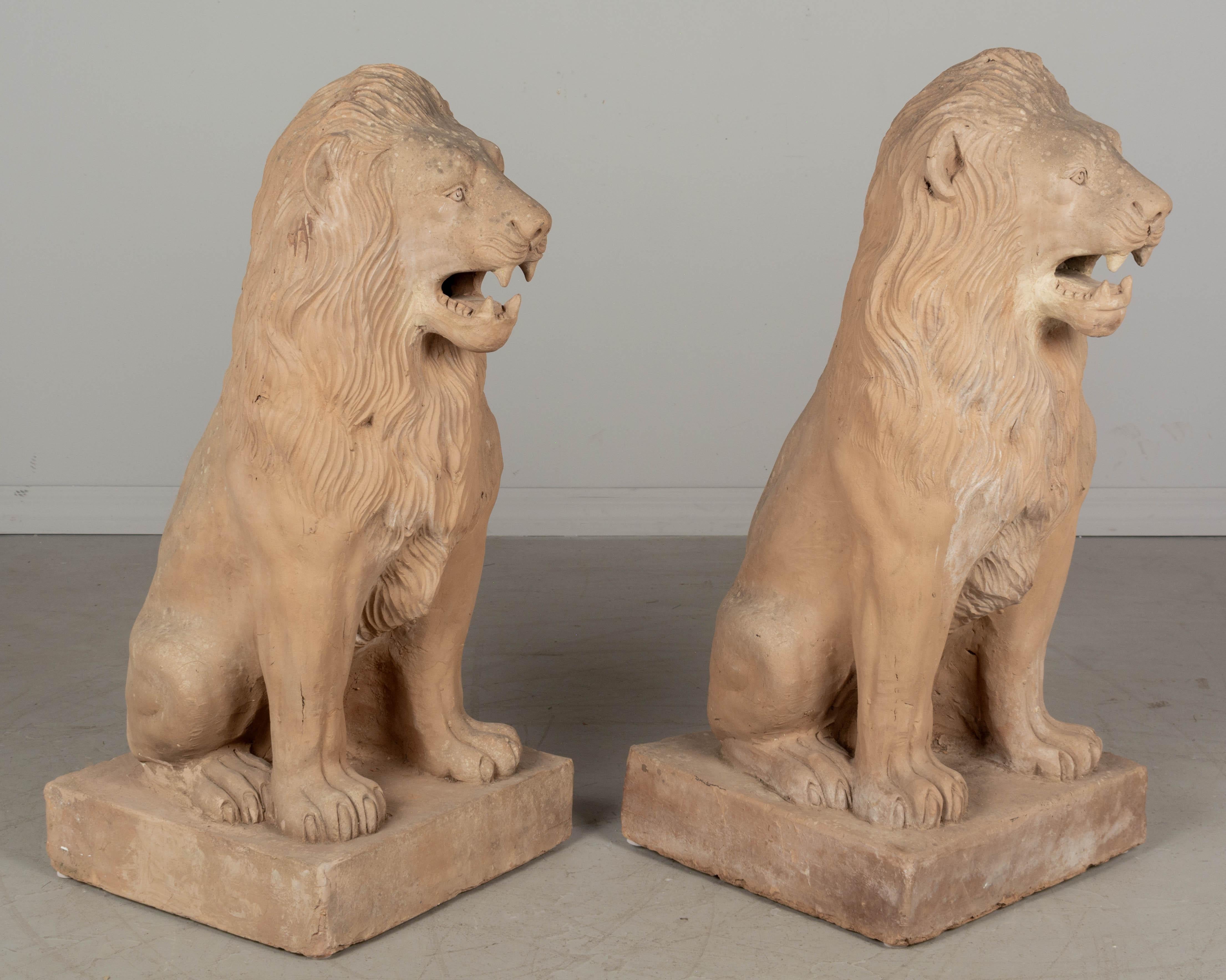 Hand-Crafted Pair of French Terracotta Garden Lions For Sale
