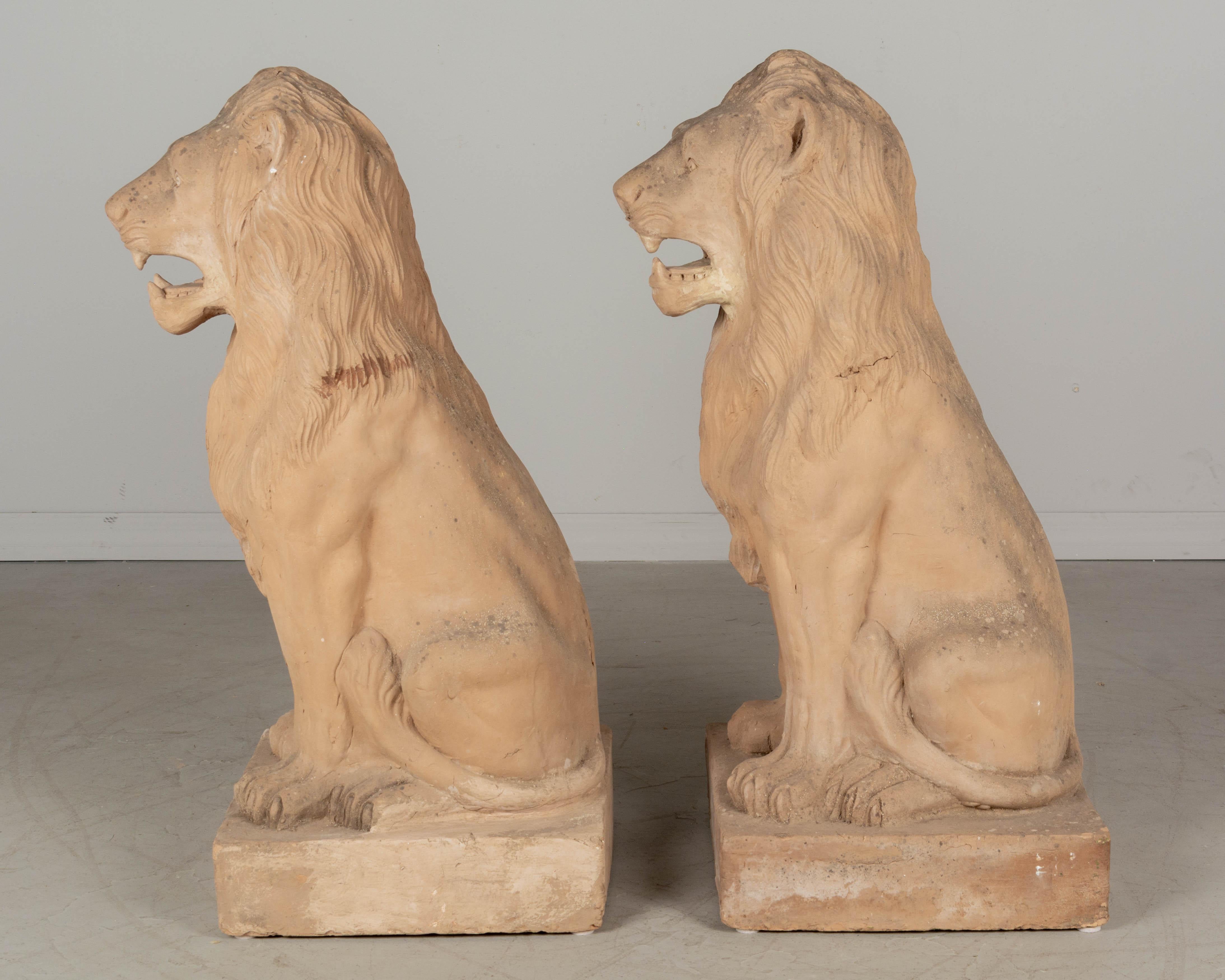 20th Century Pair of French Terracotta Garden Lions For Sale