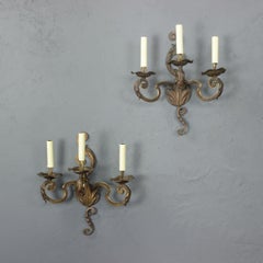 Pair of French Gilt Wrought Iron Three-Arm Wall Sconces, Louis XV Style, 1920s