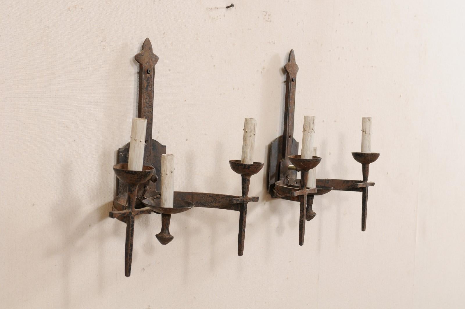 Forged Pair of French Three-Light Midcentury Torch-Style Iron Sconces For Sale