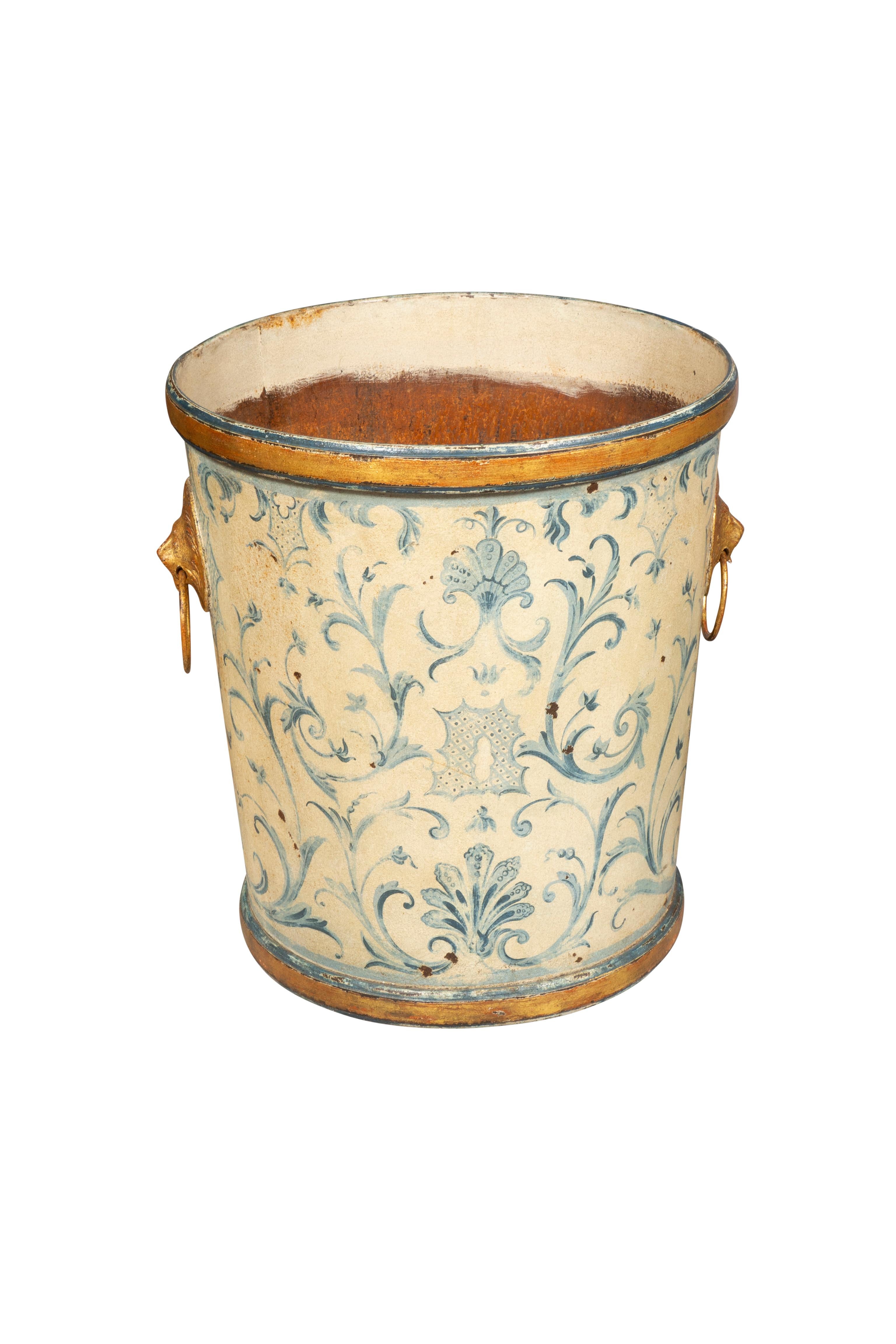 Cylindrical done in the style of the French enameled cast iron garden urns. Gilt lions head ring handles.