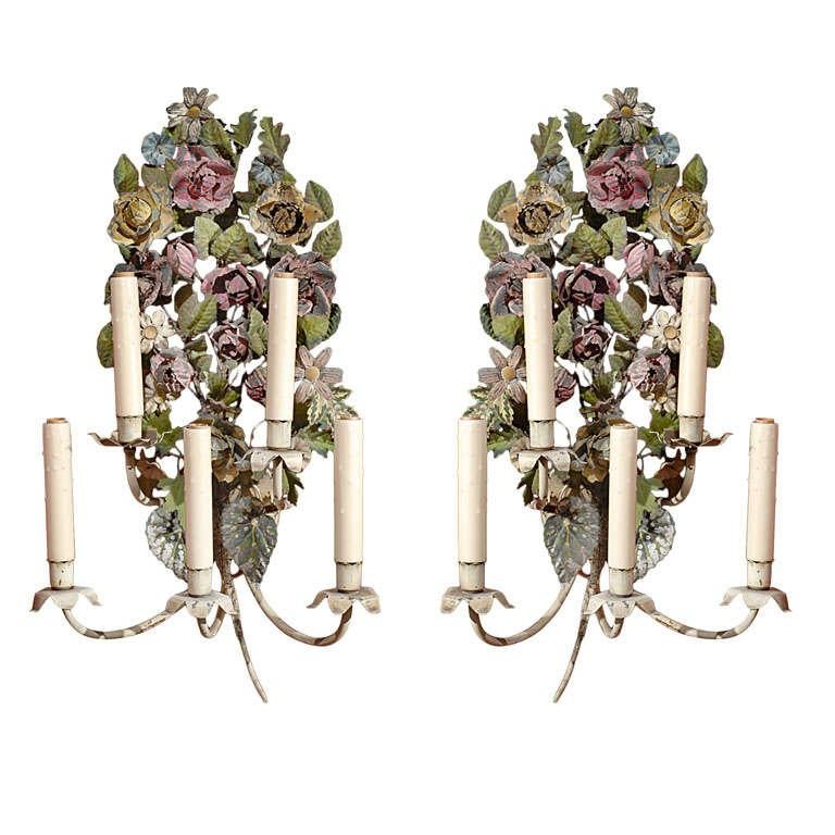Pair of floral painted tole sconces with five lights, now electrified.
Dimensions: H 26 in. x W 16 in. x D 7 in. (H 66.04 cm x W 40.64 cm x D 17.78 cm).