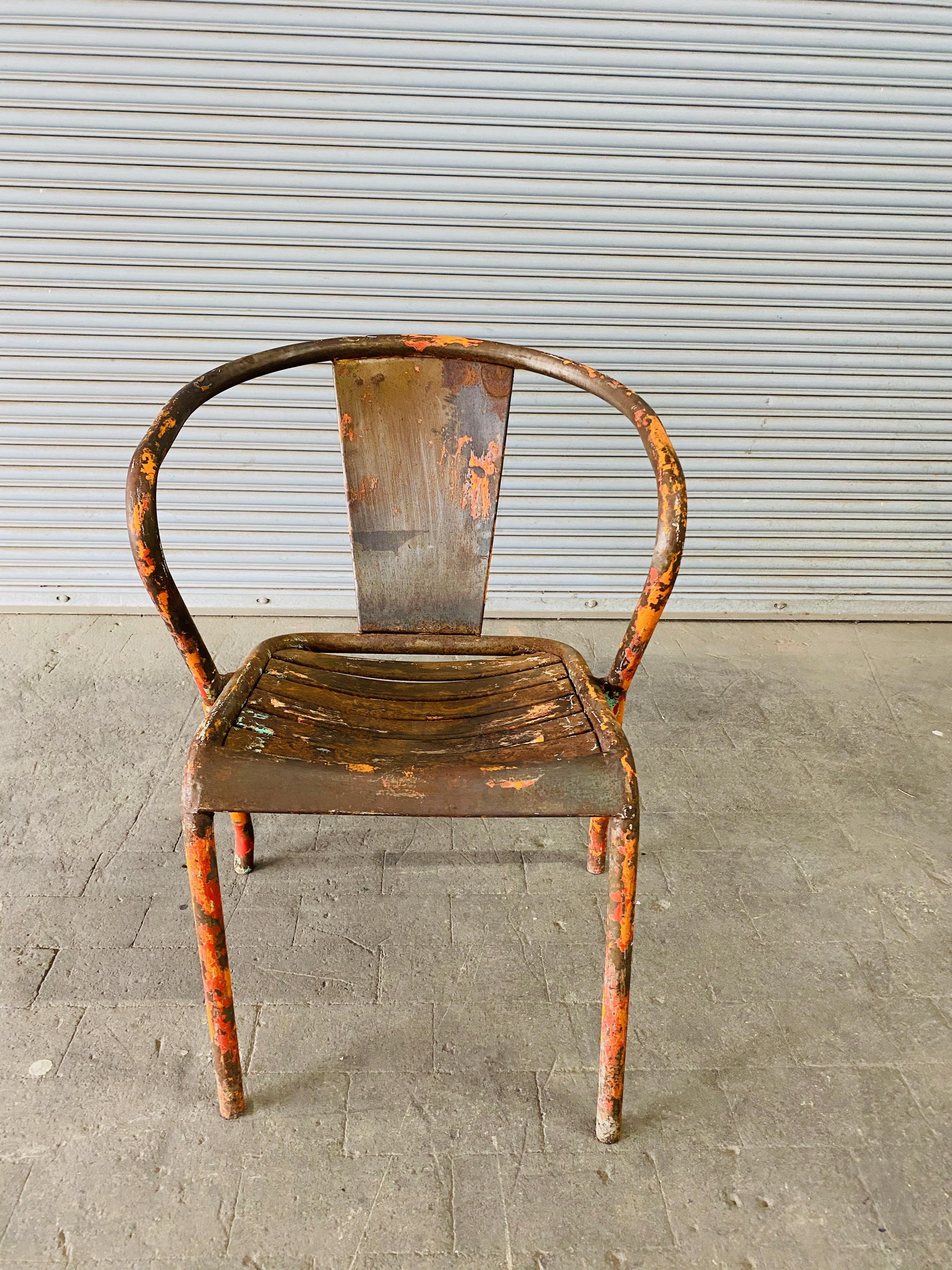 Early 20th Century Pair of French Tolix Industrial Chairs with Distressed Orange Paint Finish