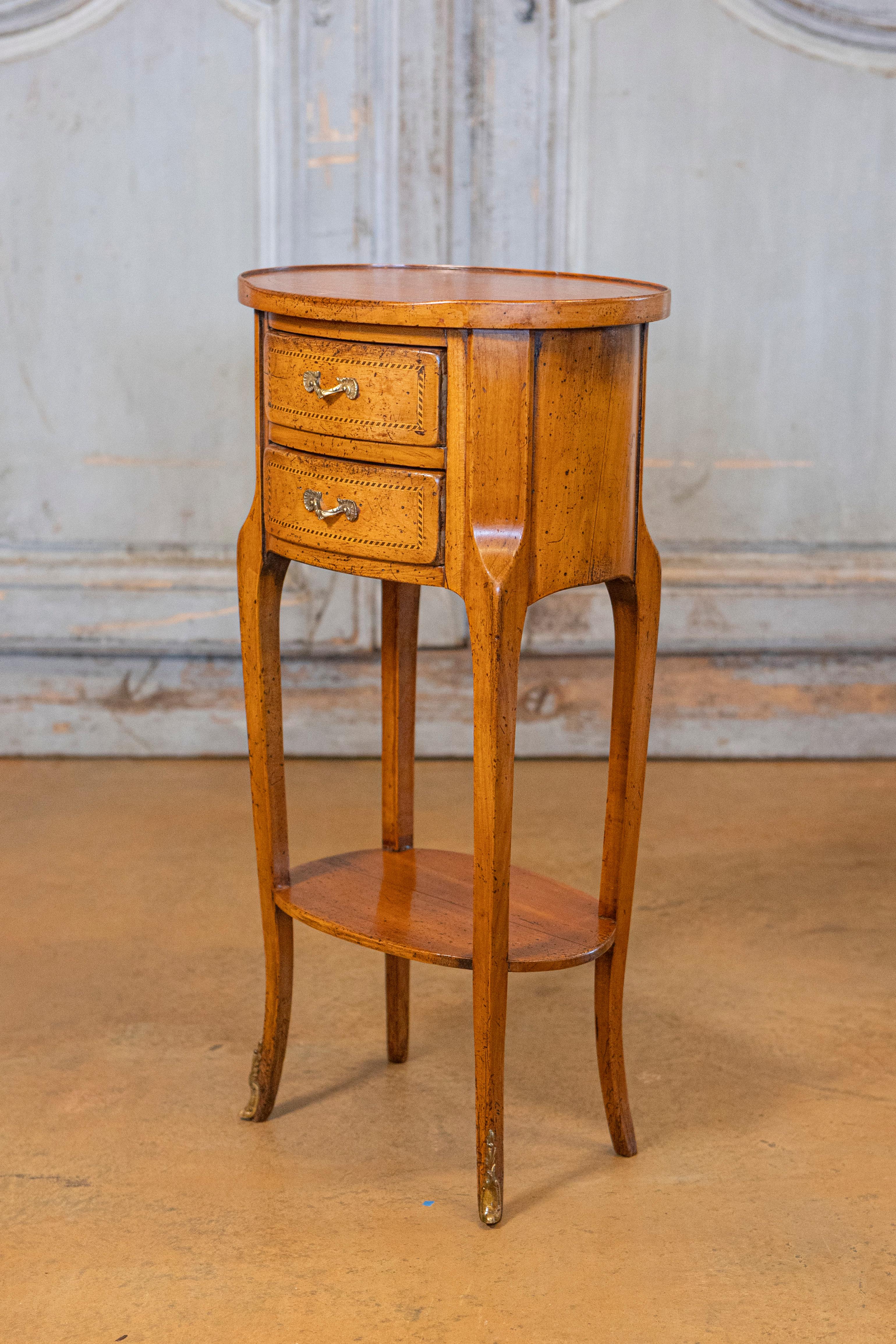 20th Century Pair of French Transition Style Oval-Shaped Fruitwood Bedside Tables with Inlay For Sale