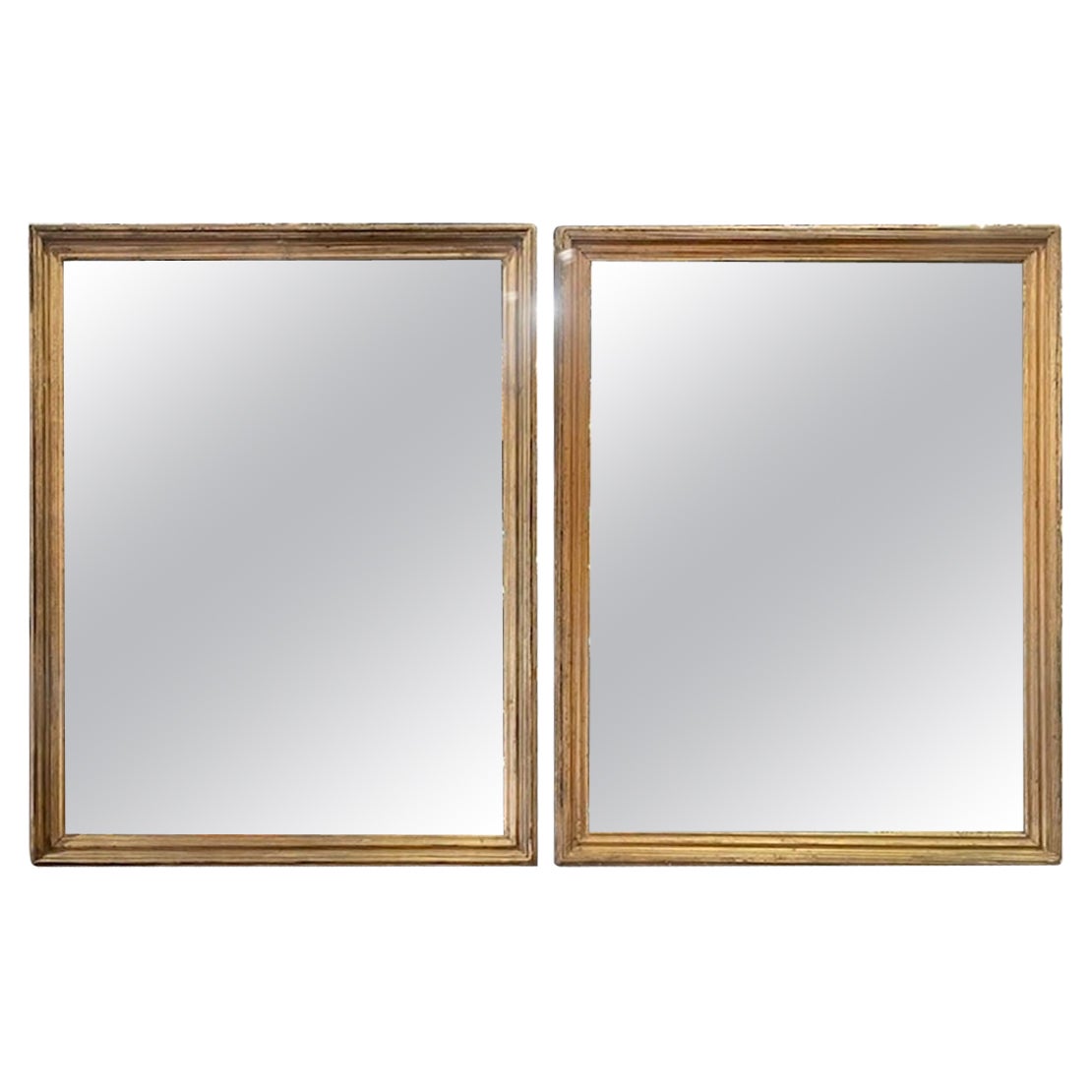 Paire de miroirs en bois doré de style transitionnel français