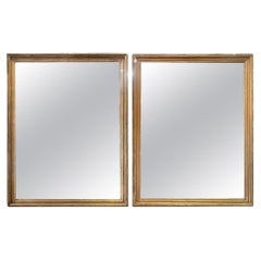Pair of French Transitional Giltwood Mirrors