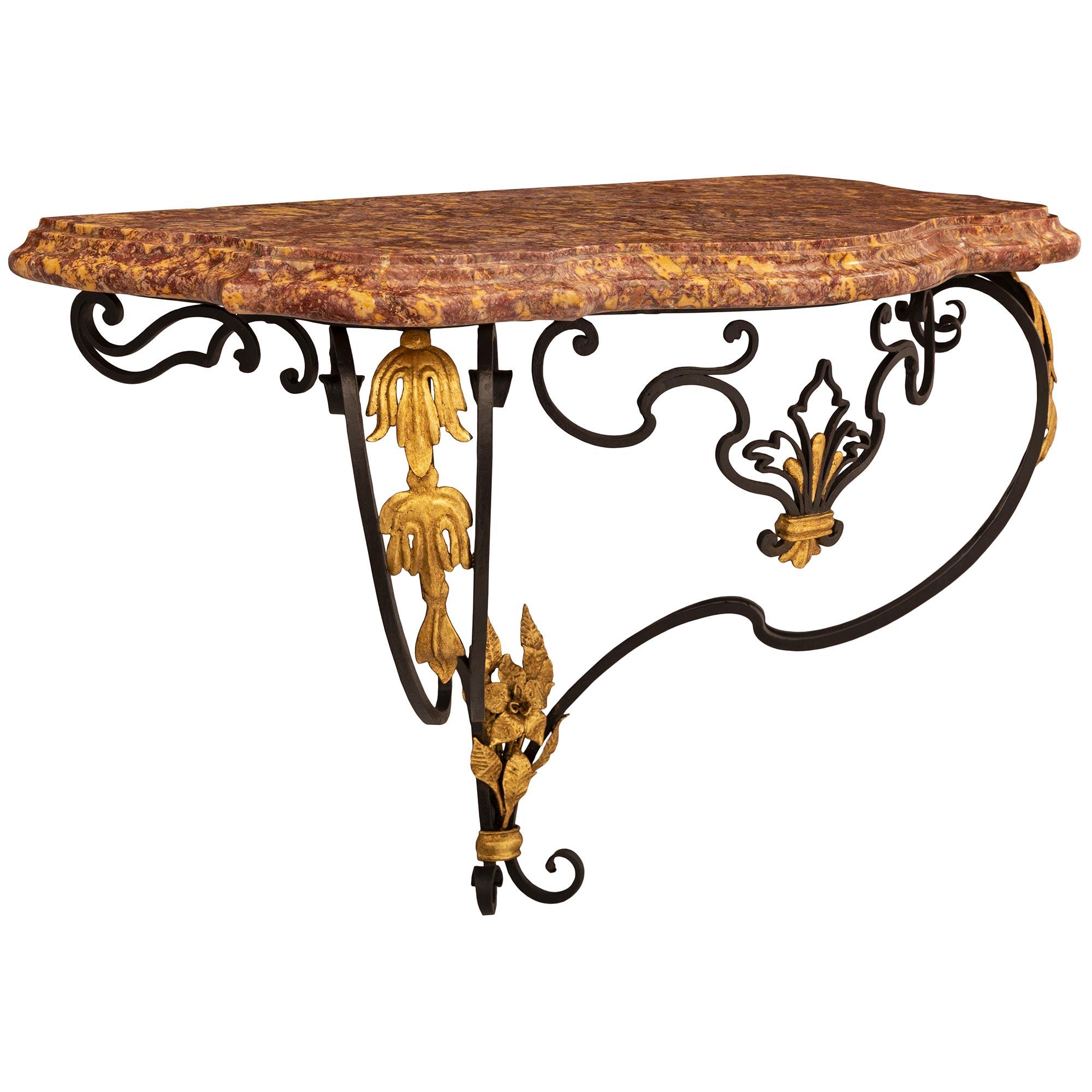 Gilt Pair of French Turn of the Century Louis XV St. Wrought Iron and Marble Consoles For Sale