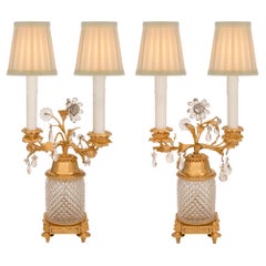 Pair of French Turn of the Century Louis XVI St. Ormolu and Crystal Lamps