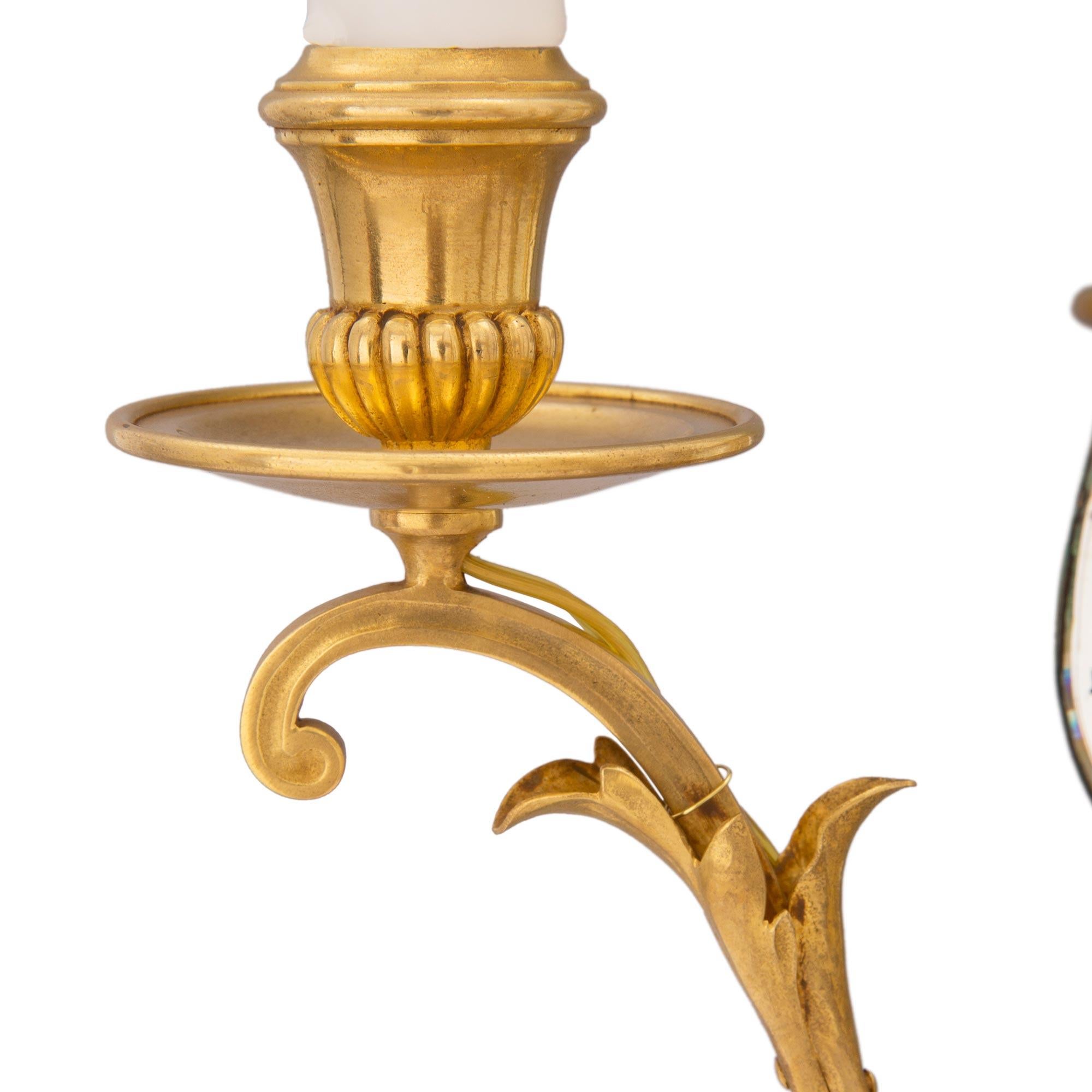 20th Century Pair of French Turn-of-the-Century Venetian Style Ormolu and Mirrored Sconces For Sale