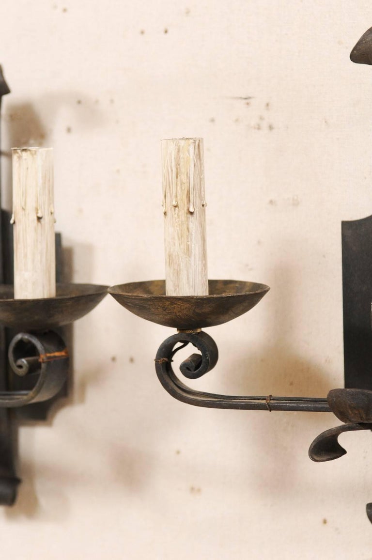 Pair of French TwoLight Iron Sconces with Scrolled Arms