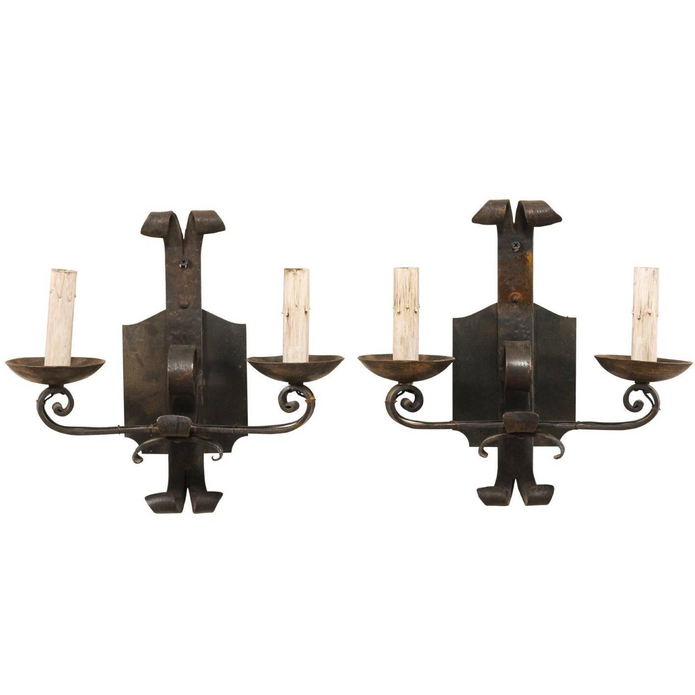 Pair of French Two-Light Hand-Forged Iron Sconces with Scrolled Arms