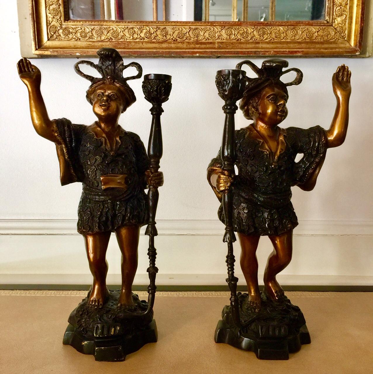 Pair of French two-toned patinated bronze Moorish inspired figure candleholders
Lovely and fun, these Moorish Inspired beckoning figures are adorned in extravagant plumed headdresses, decorated caftans and bear torches.