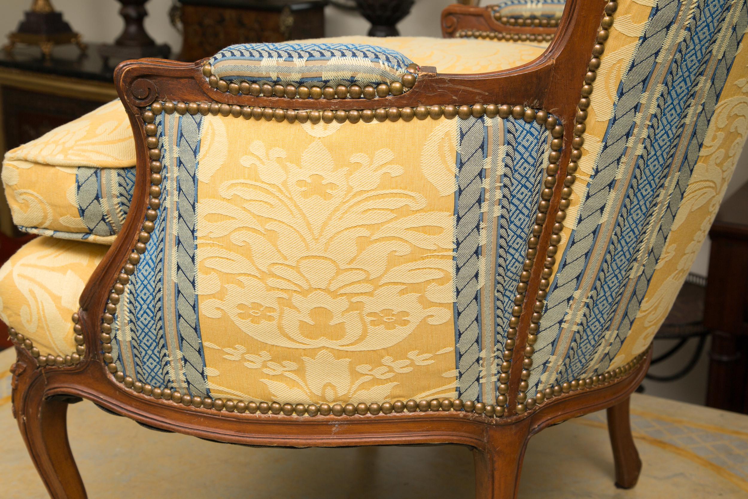 Pair of French Upholstered Bergere Chairs In Good Condition In WEST PALM BEACH, FL
