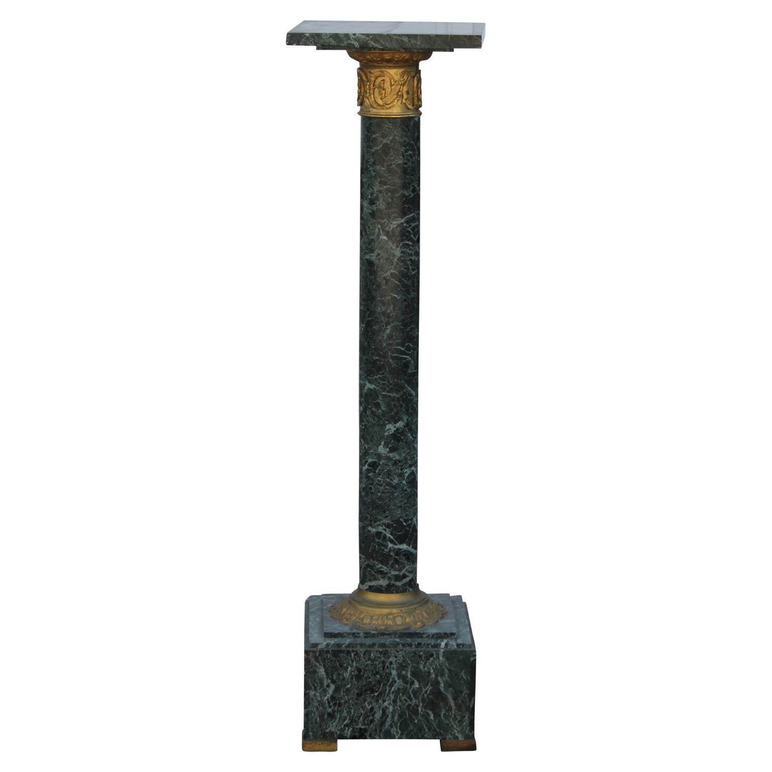 Neoclassical Pair of French Verde Green Marble Column Pedestals with Bronze Capital Detail