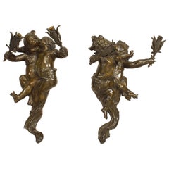 Paire d'appliques murales en bronze patiné avec chérubin de style victorien français de Joseph Cheret