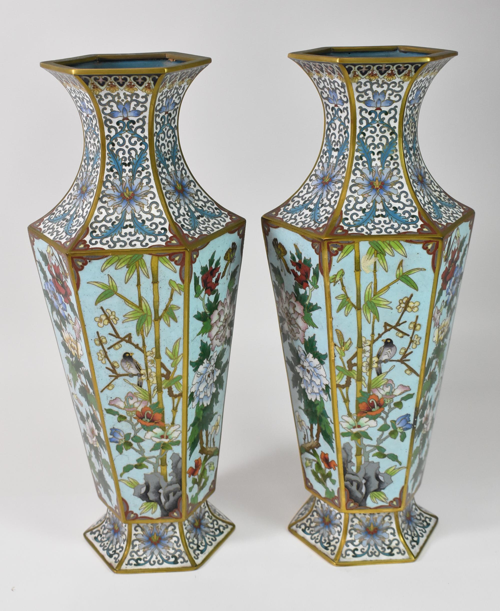 Pair of French Victorian Cloisonné Vases. 19th Century, Victorian period, France origin. Chinoiseries Blue enamel on porcelain with bird foliage and butterflies. Hexagon shape. Great condition. Dimensions: 15.5