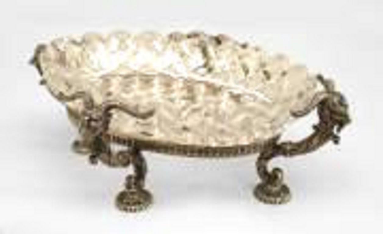 Pair of French Victorian (19/20th Cent) compotes with a silver-plated oval base with ram heads supporting a geometric diamond design cut crystal bowl with a scalloped top.