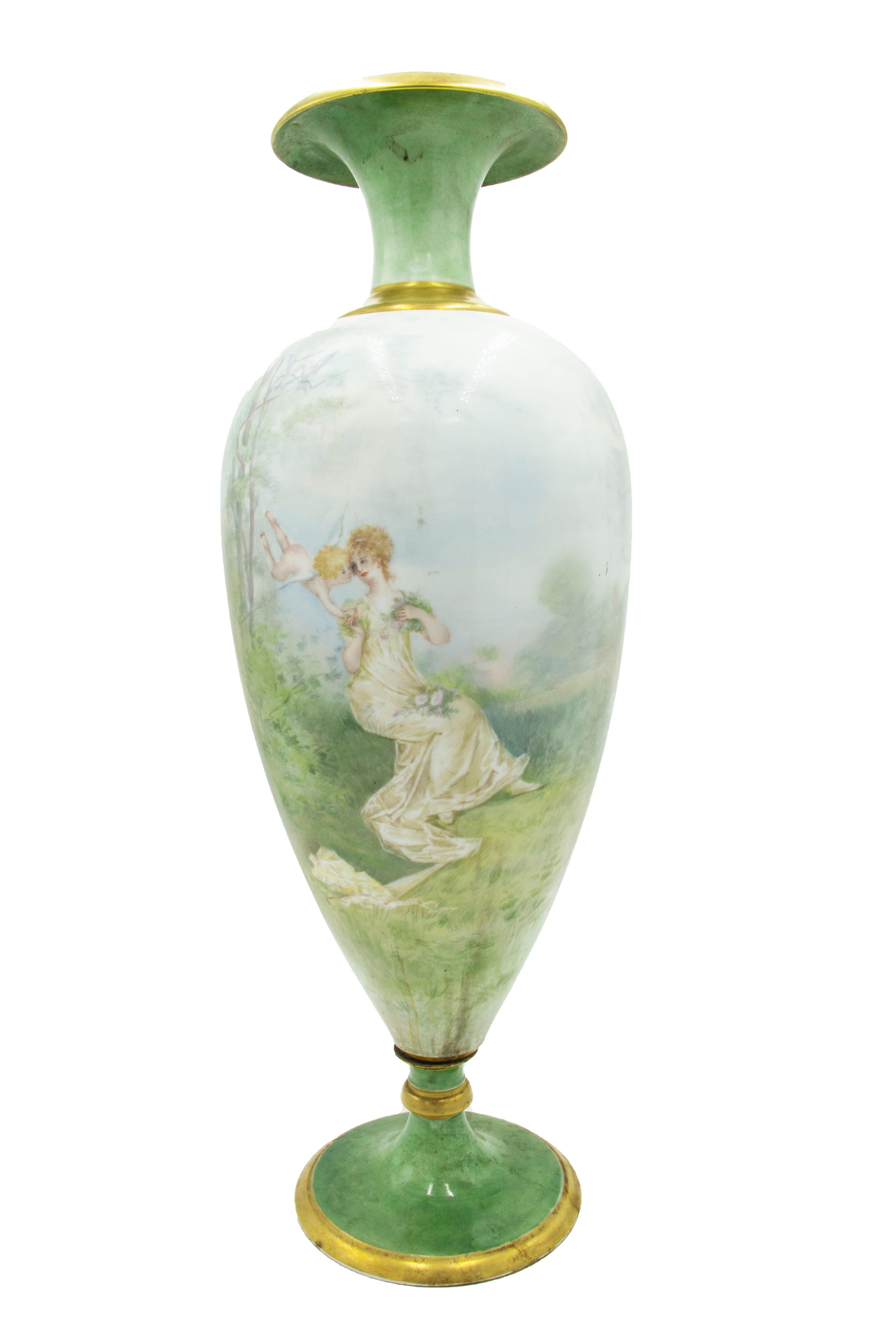 Pair of French Victorian green Limoges porcelain and gilt trimmed vases with lady and cupid scene (PRICED AS Pair)
