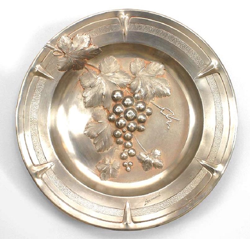 Pair of French Victorian pewter round wall plates with fruit in relief. (signed ERMENAULT) (Priced As Pair).
  