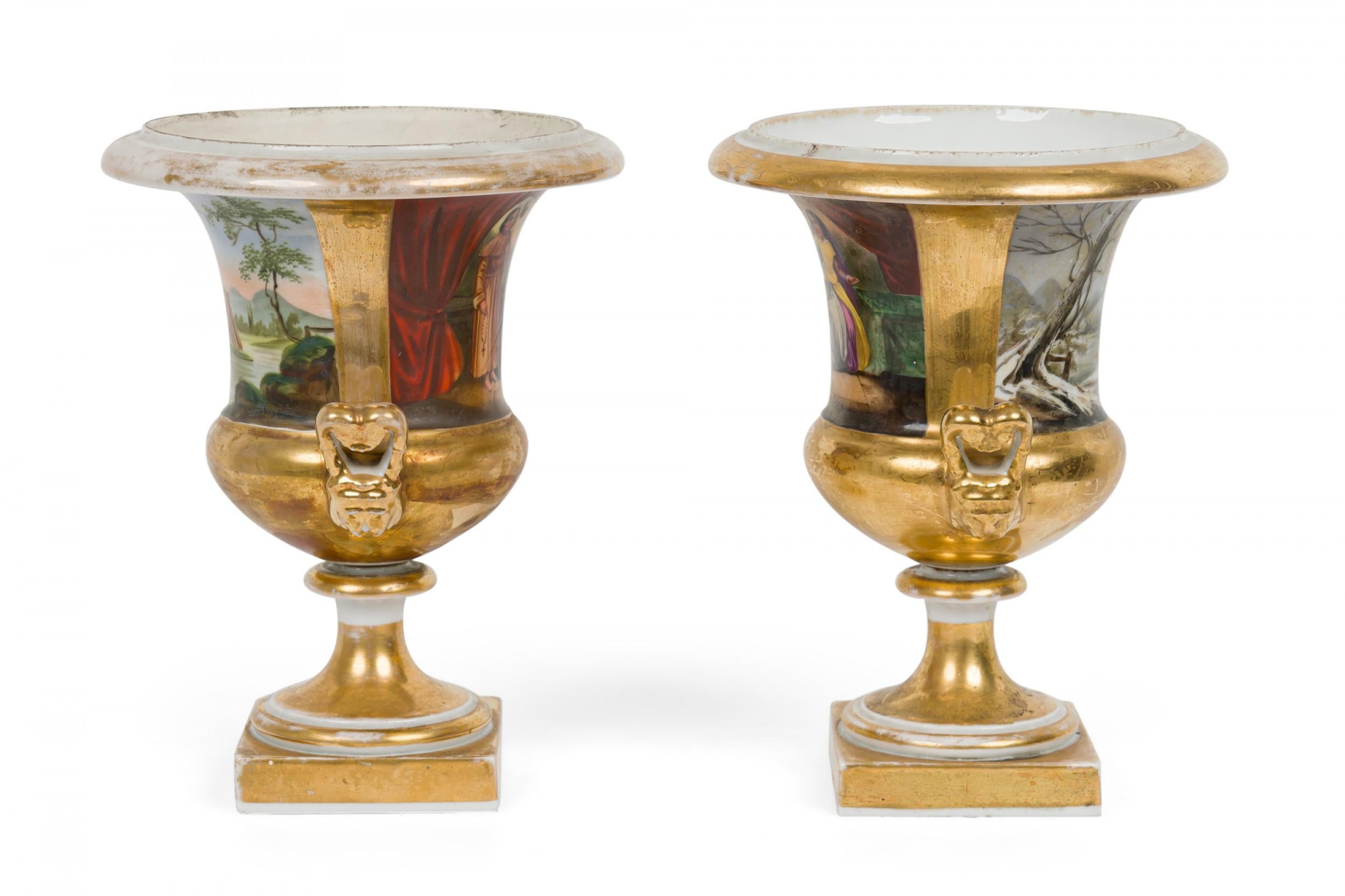 Pair of French Victorian Sevre Compagna Gilt and Painted Porcelain Urns In Good Condition For Sale In New York, NY