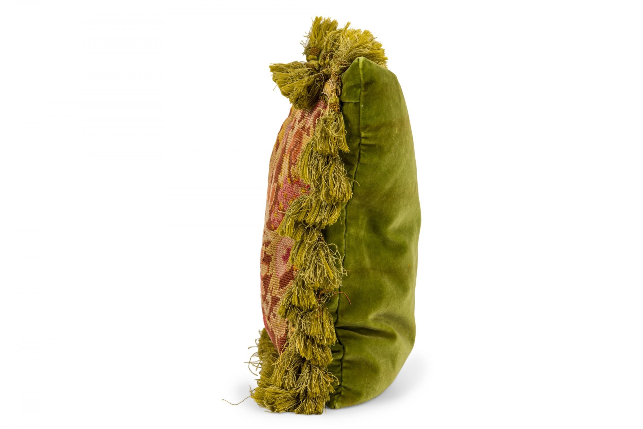 PAIR of French Victorian throw pillows with pink and beige floral tapestry fronts and green fabric backs, trimmed with bright green tassels. (PRICED AS PAIR)(Similar pillow: NWL6593B)

Condition: Good; Wear consistent with age and use