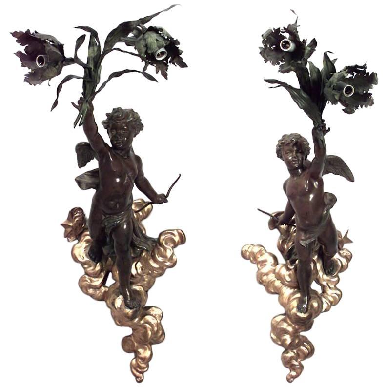Pair of French Victorian Patinated Brass Cupid Wall Sconces For Sale