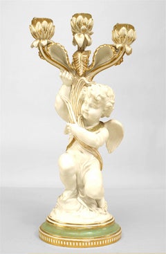 Pair of French Victorian White and Gilt Porcelain Cupid Candelabras