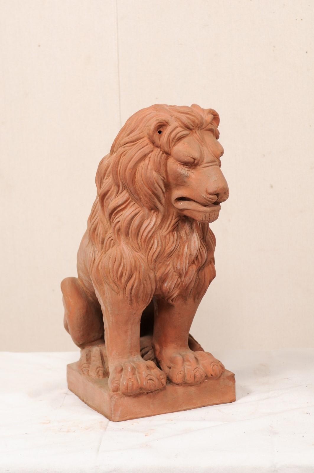 Carved Pair of French Vintage Terracotta Snarling Lion Statues For Sale