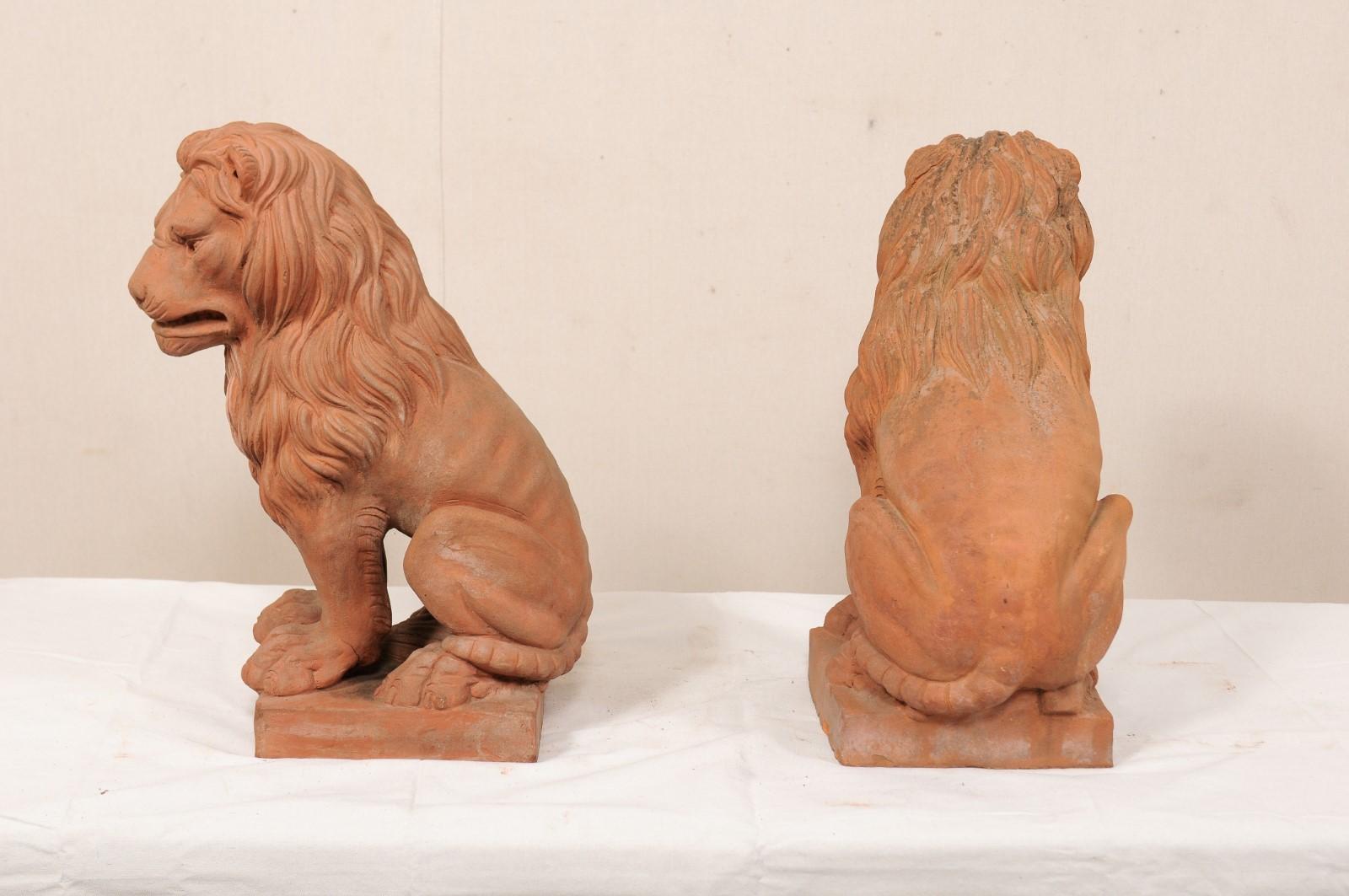 Pair of French Vintage Terracotta Snarling Lion Statues For Sale 1