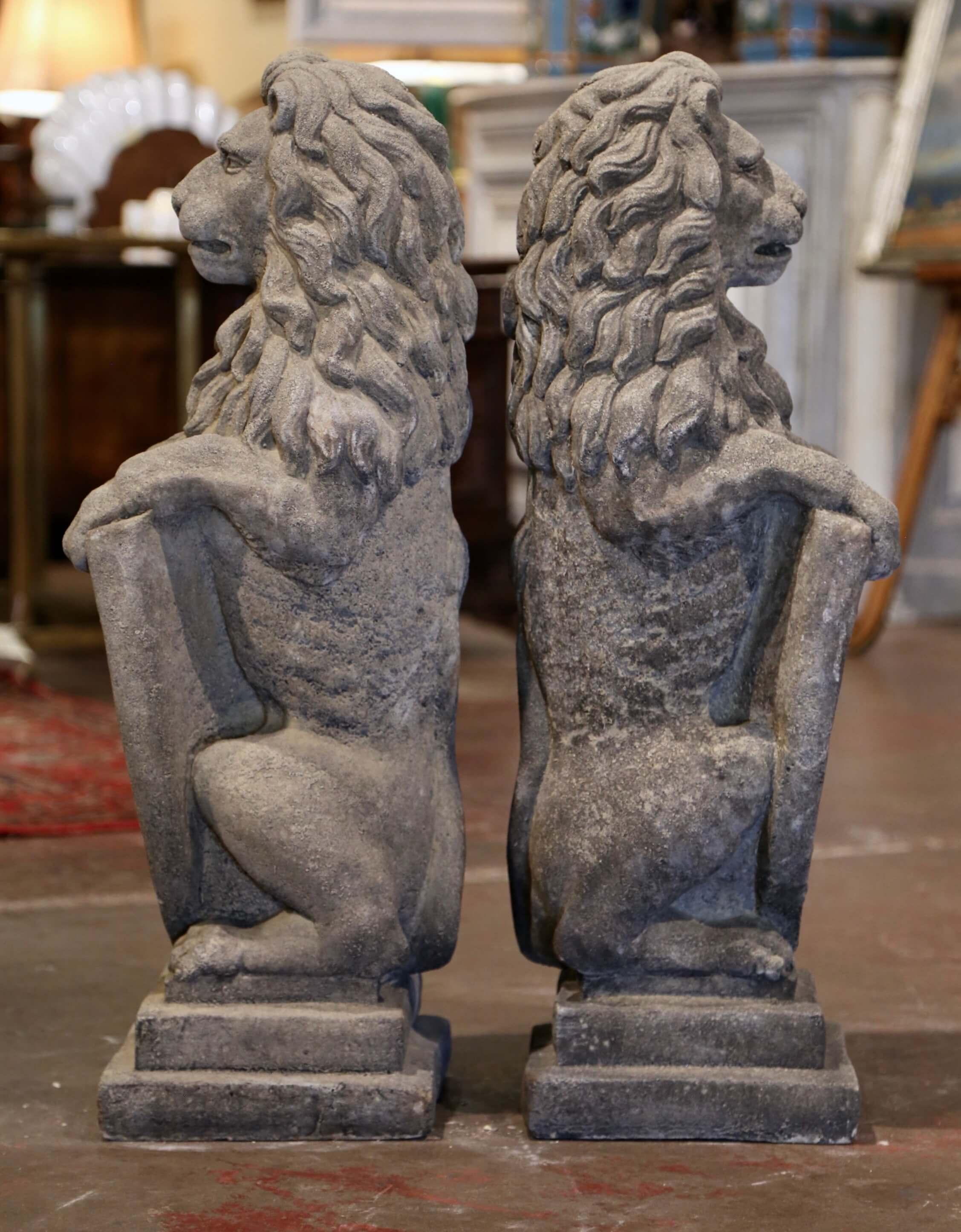 20th Century Pair of French Weathered Carved Cast Stone Garden Statuary Wescott Lions For Sale