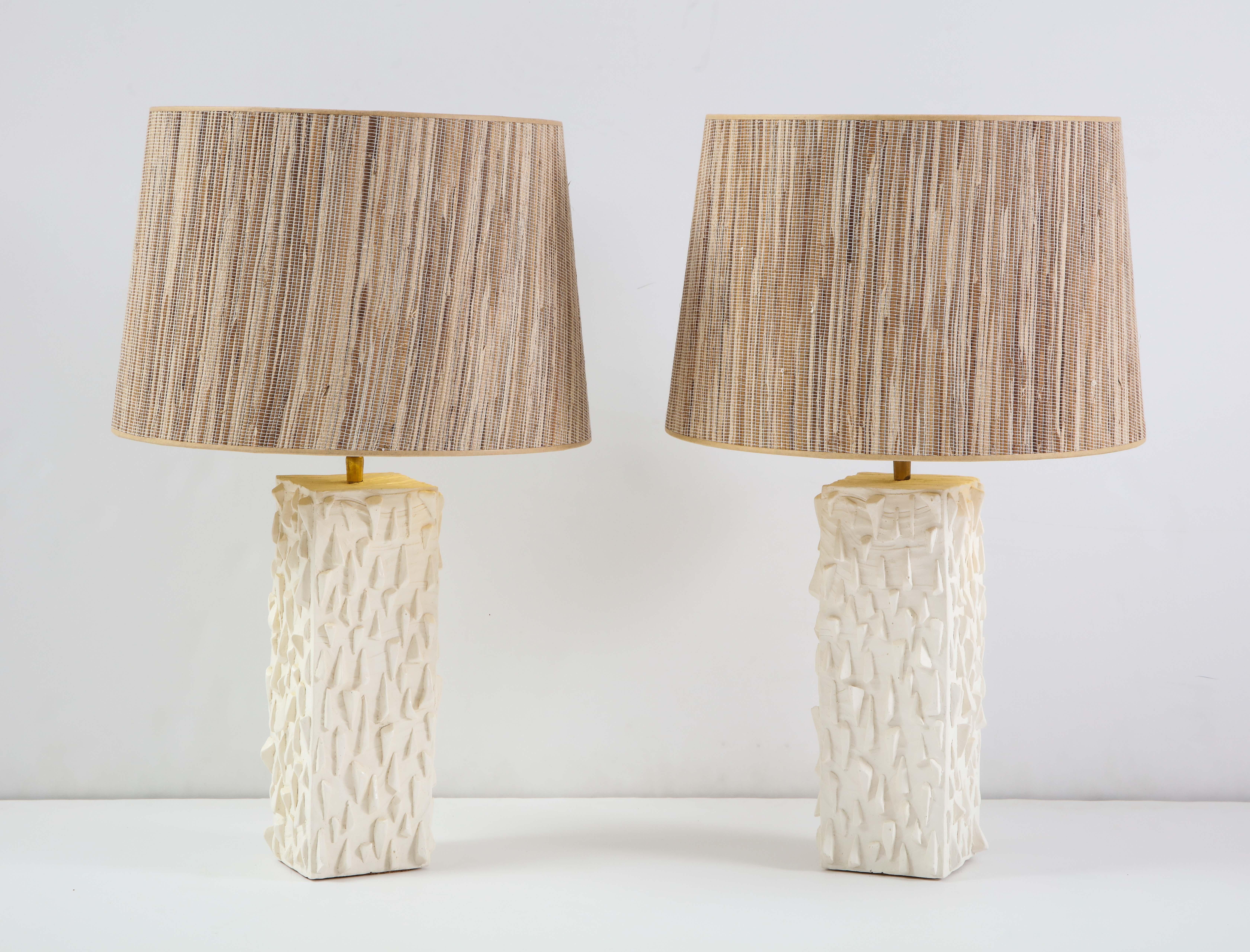 Pair of French white ceramic lamps, signed Vincent V.
 