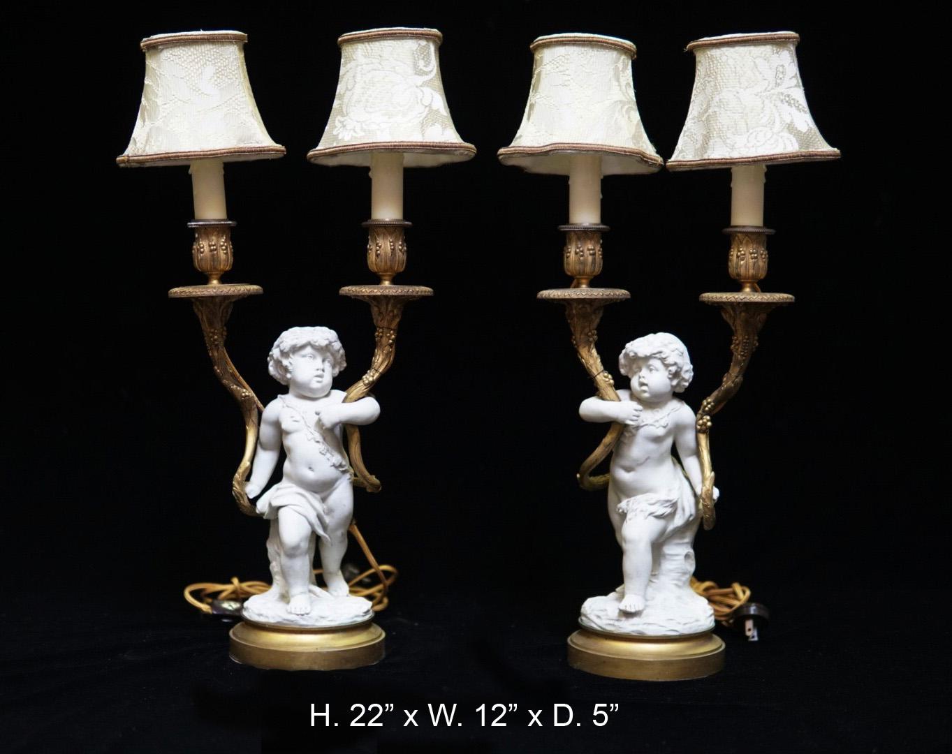Exquisite pair of French Louis XV style white bisque figures ormolu mounted to lamps, 19 century
Each lamp is with a white bisque standing putti with a foliate wreath over his shoulder, wielding two scrolling foliate-inspired gilt bronze candle