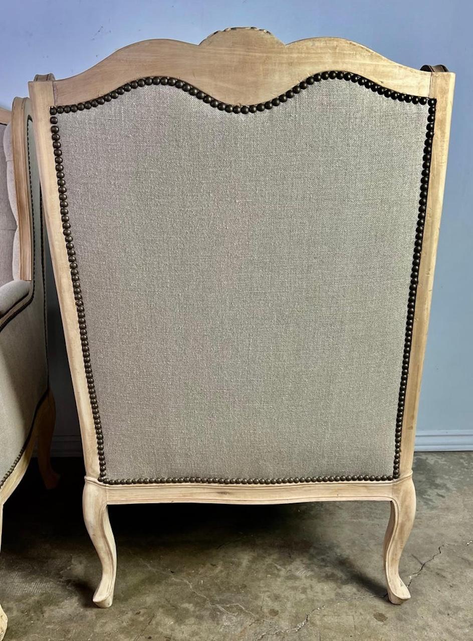 Pair of French Wingback Armchairs w/ Ottomans For Sale 4
