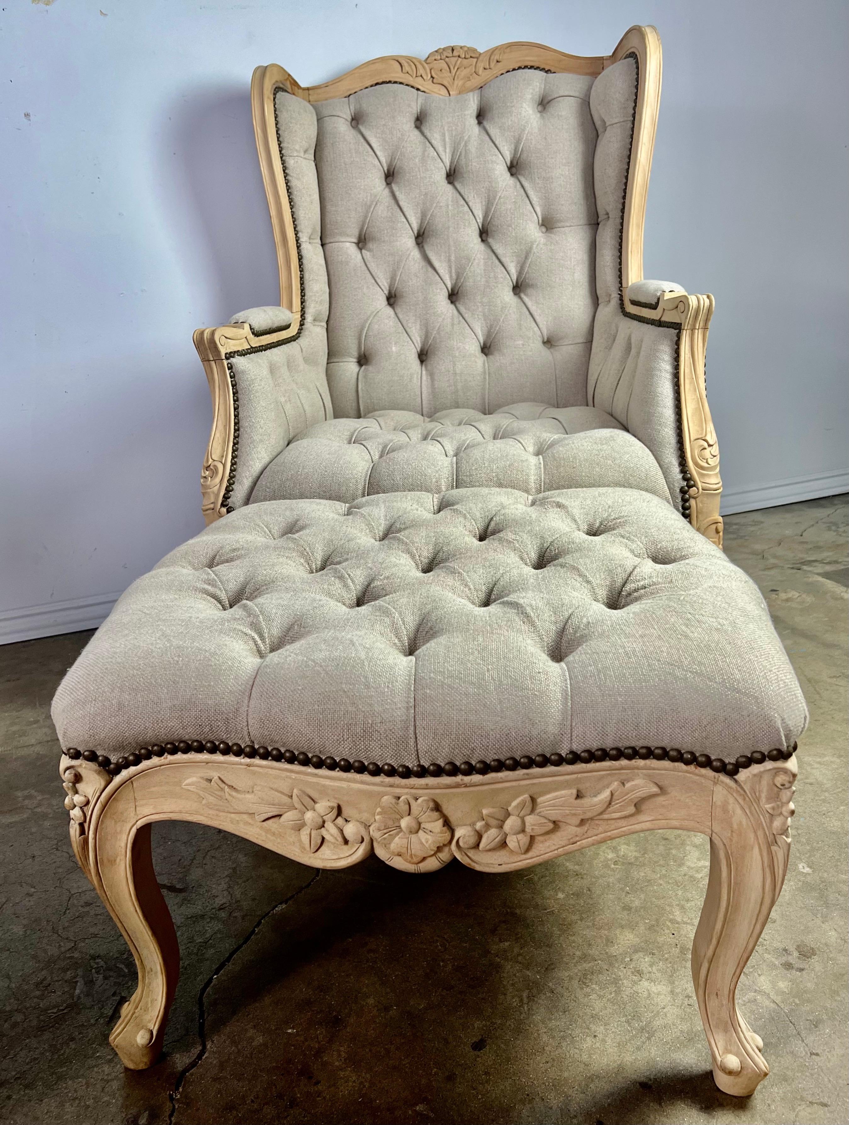 Pair of French Wingback Armchairs w/ Ottomans In Excellent Condition For Sale In Los Angeles, CA
