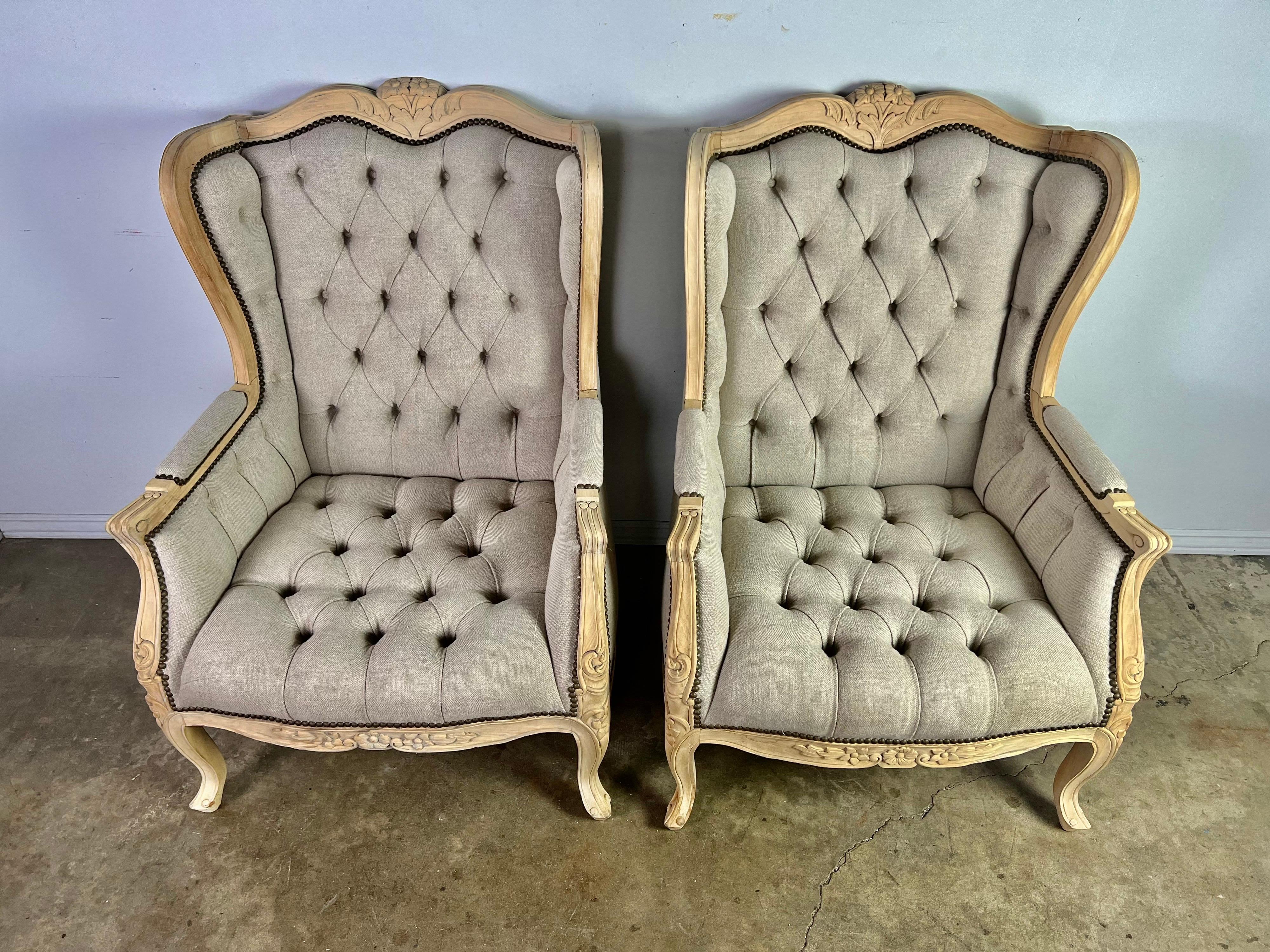 Linen Pair of French Wingback Armchairs w/ Ottomans For Sale