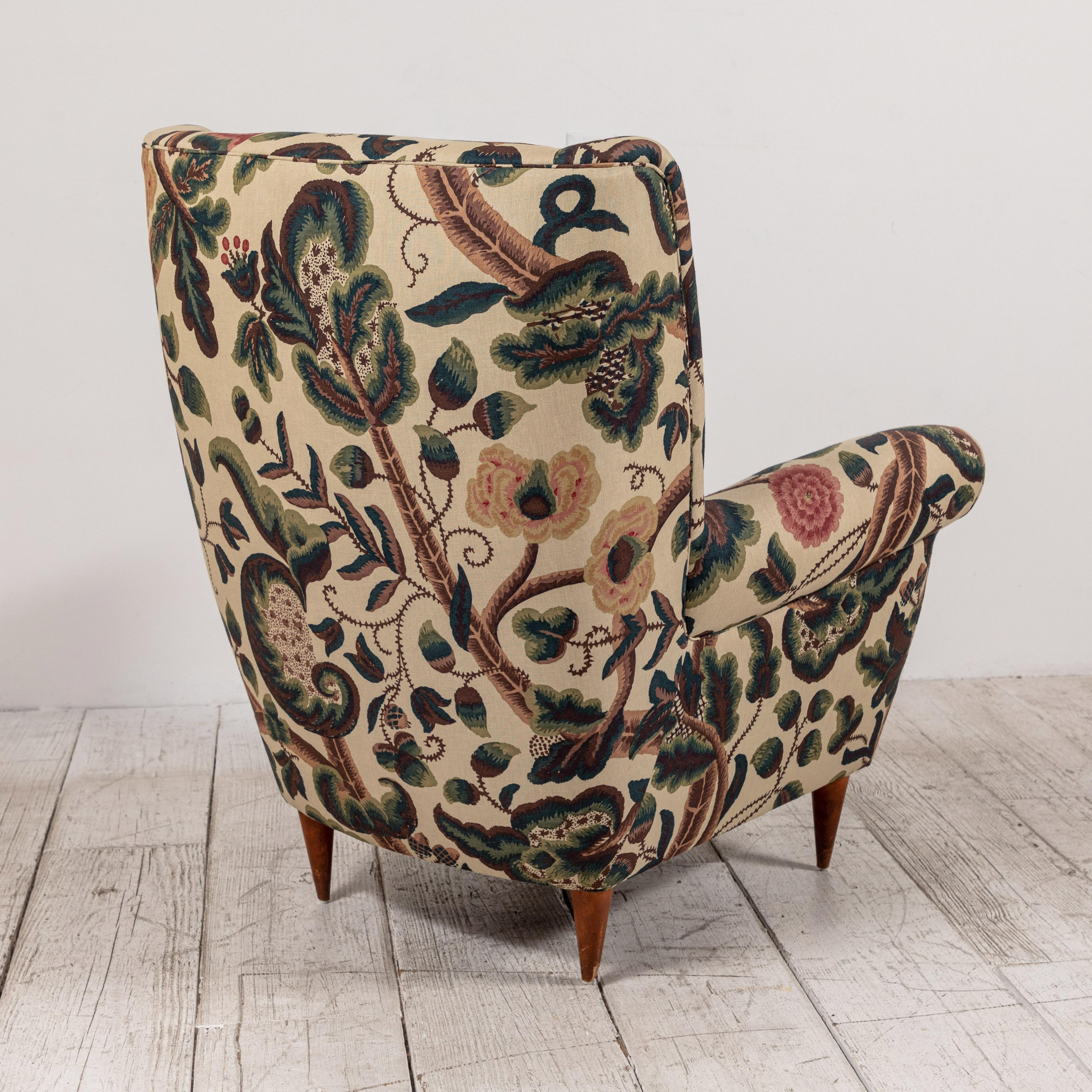 Pair of French Wingback Chairs upholstered in Floral Fabric 1