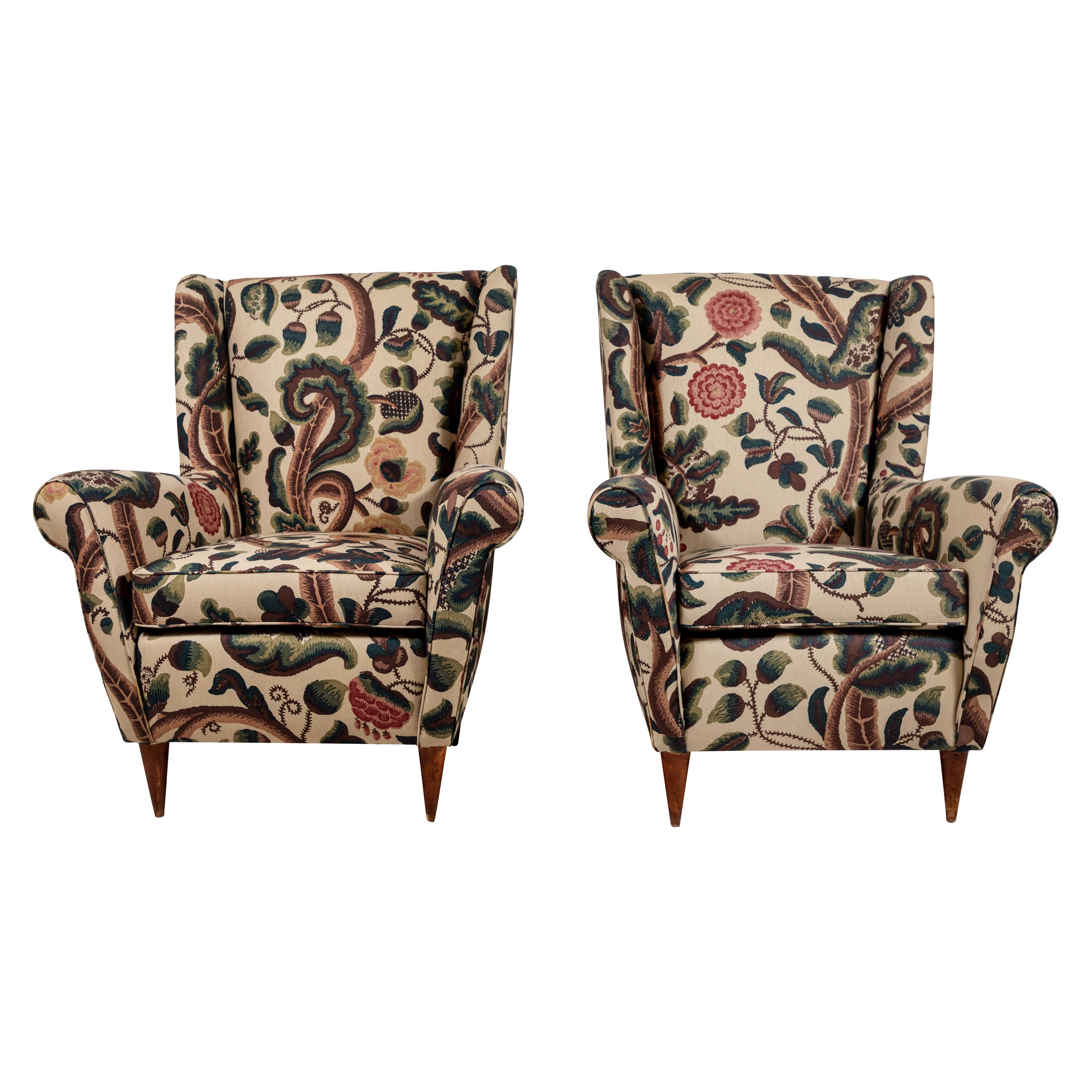 Pair of French Wingback Chairs upholstered in Floral Fabric