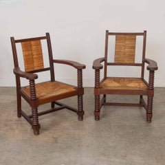 Pair of French Wood and Woven Chairs by Charles Dudouyt