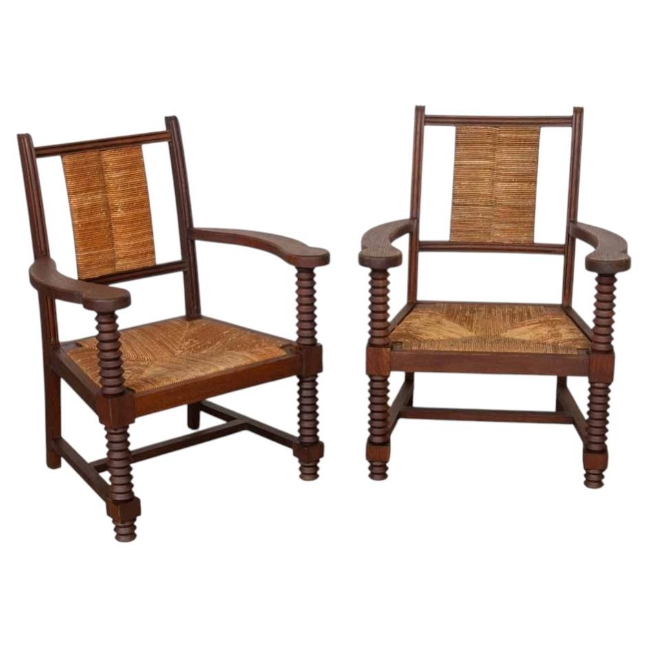 Pair of French Wood and Woven Chairs by Charles Dudouyt