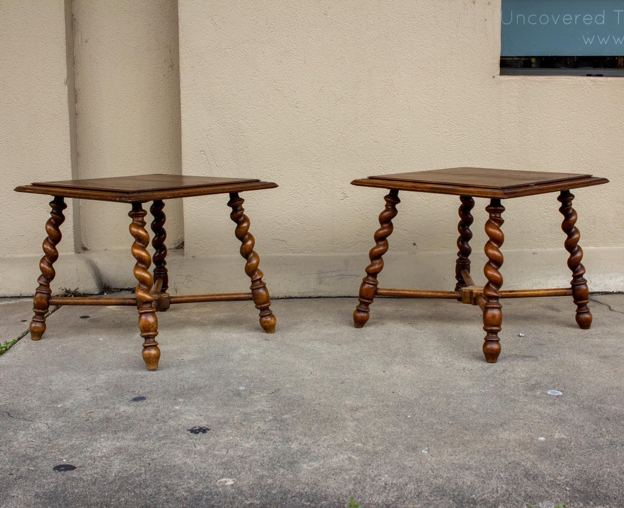This pair of matching French wood side tables features barley twist legs and square tops. Their low structure is ideal for use as lamp tables. Each measures 18