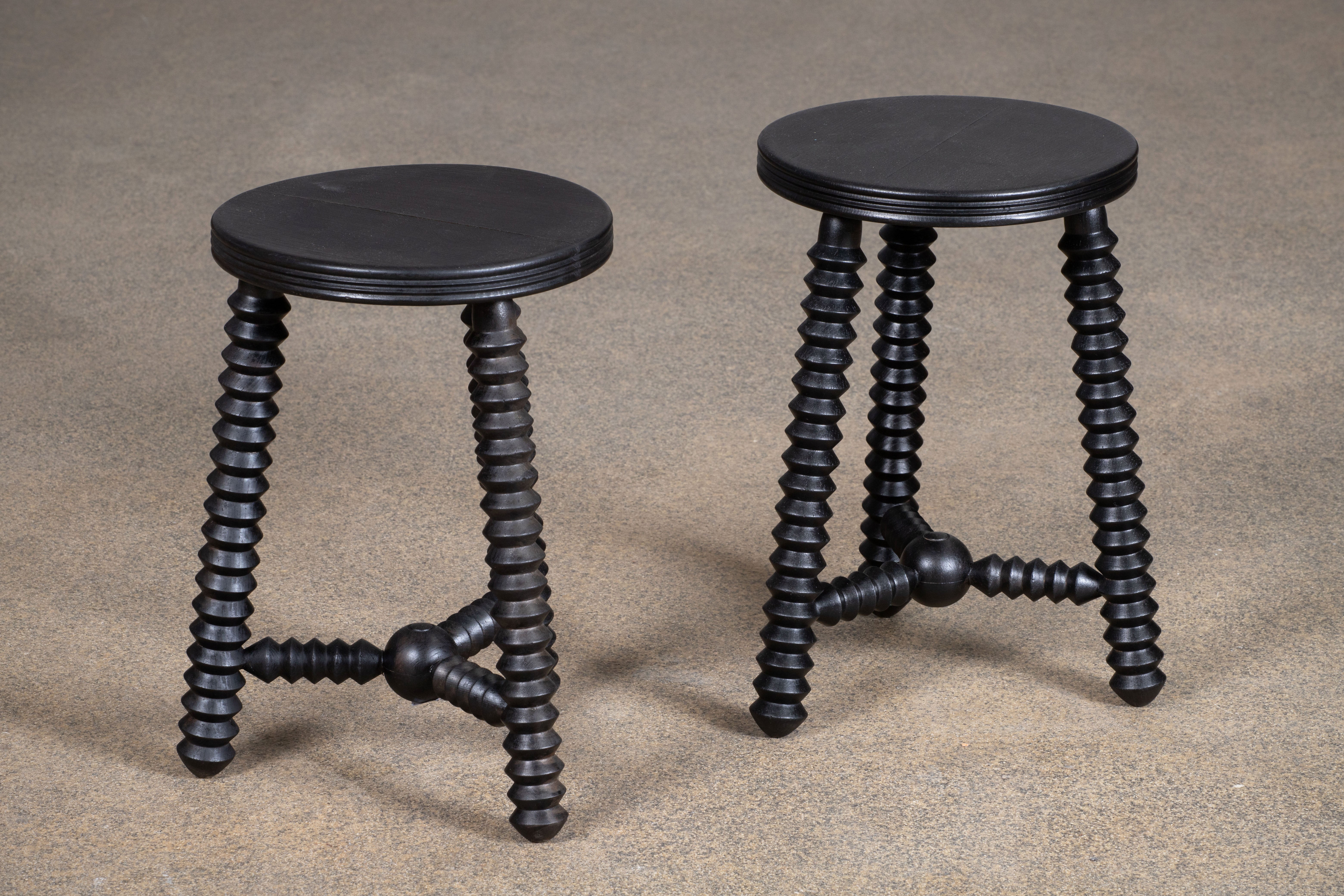 Beautiful carved stools or side tables attributed to Charles Dudouyt, made in France, 1940's. Ebonized wood finish with circular top and three leg base.
A major figure in early 20th-century French design, Charles Dudouyt moved France’s design