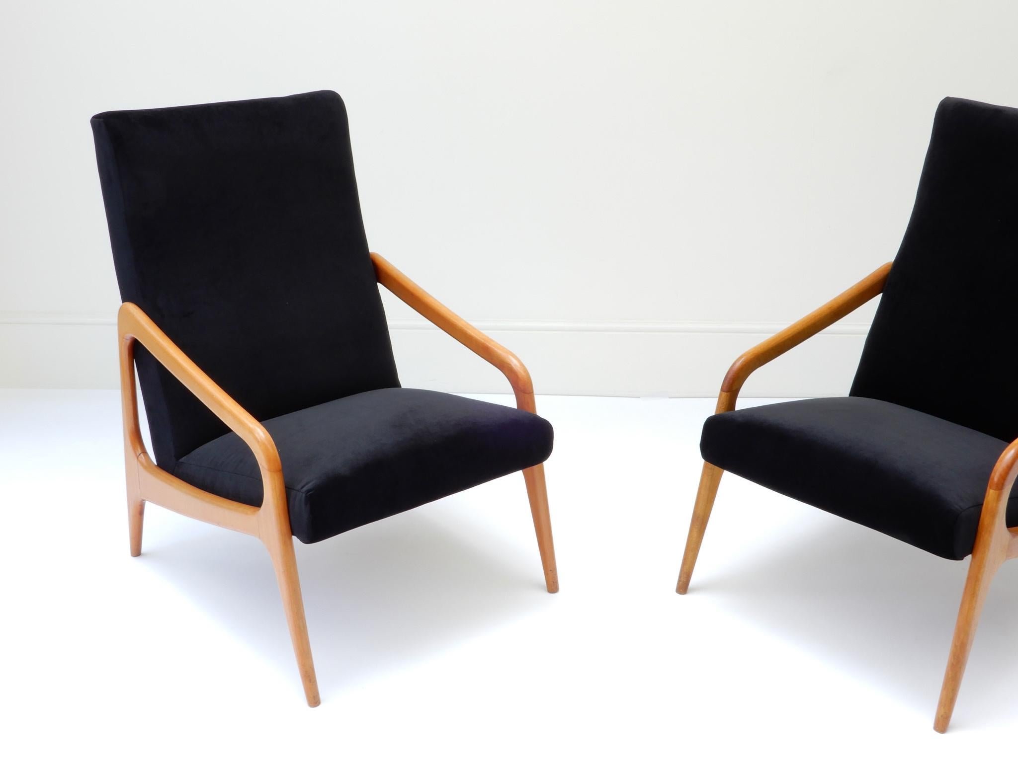 Pair of French wooden black velvet chairs, 1960s.

 