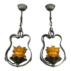 Vintage Pair of French Wrought Iron and Orange Glass Flower Shaped Pendant Lights