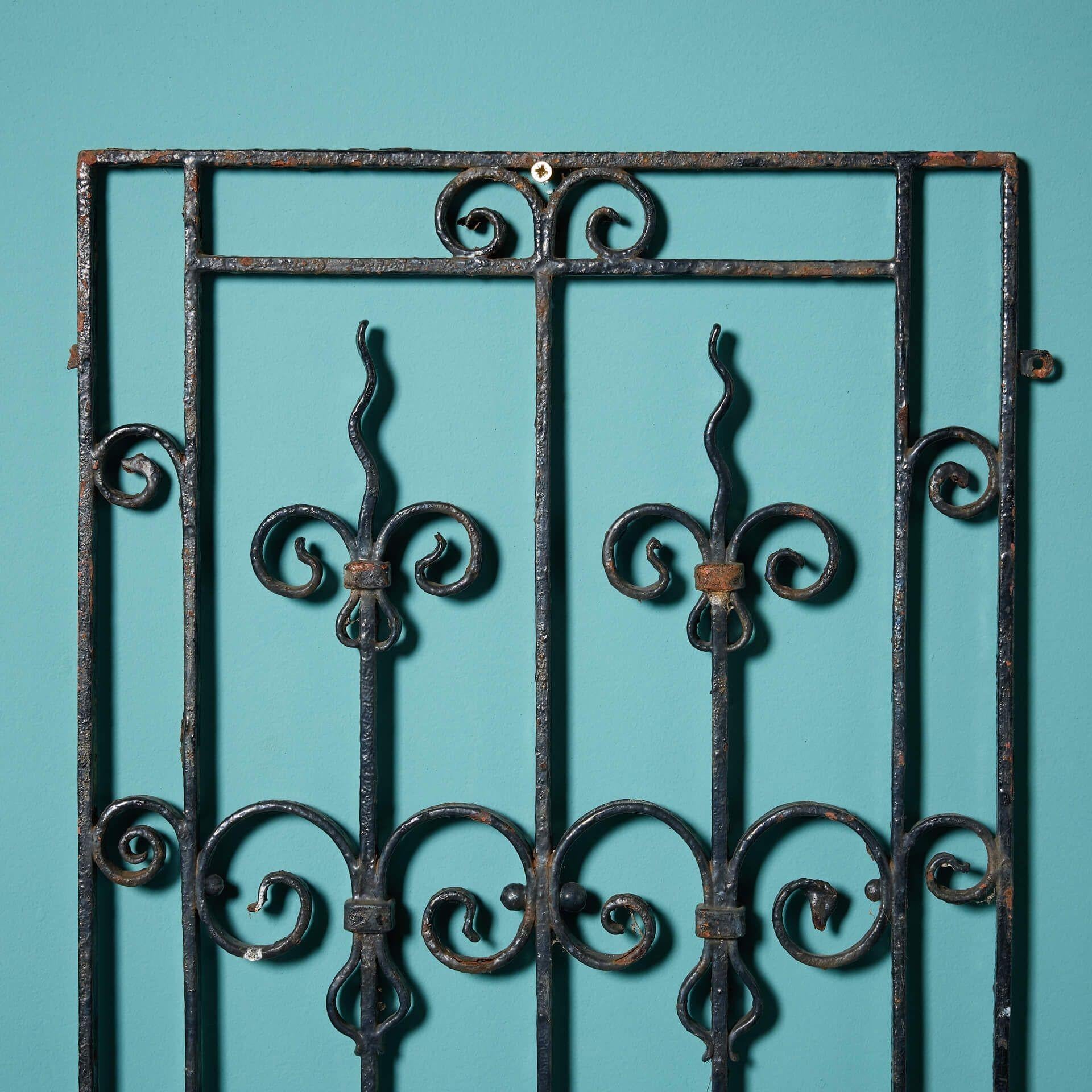 A pair of French wrought iron decorative wall hangings in a stunning Louis style.

Beautifully handcrafted with twists and scrolls, these antique iron panels date from circa 1890 and offer a glimpse into craftsmanship of the 19th century!

The pair