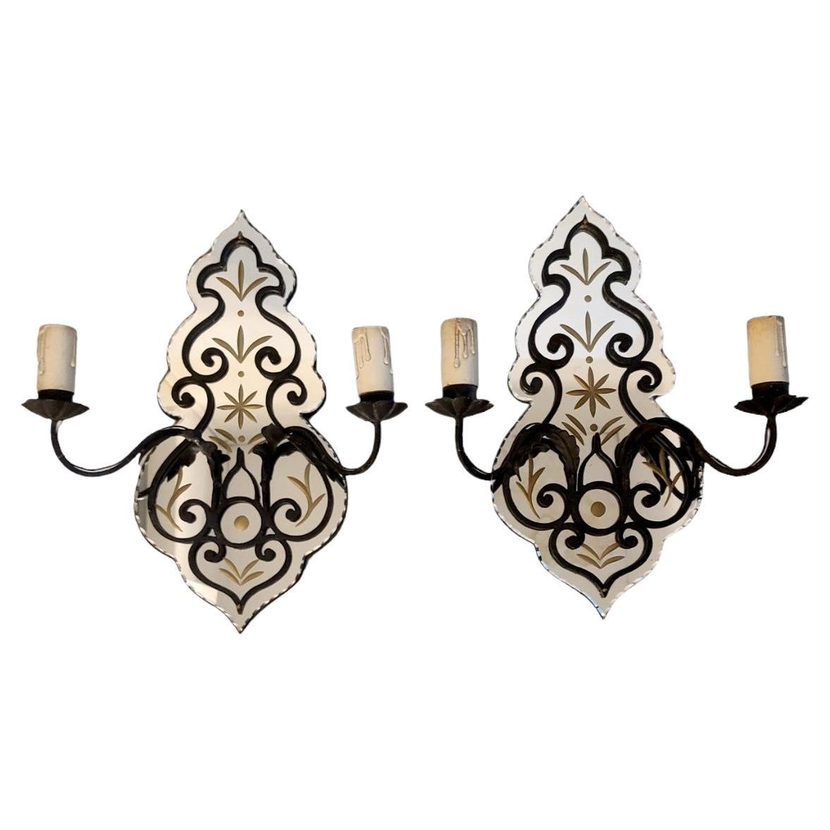 Pair of French Wrought Iron Sconces with Mirrored Backs For Sale