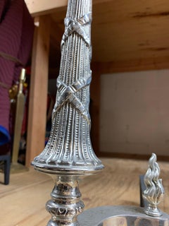 Pair of French X-Andirons with Flame Head