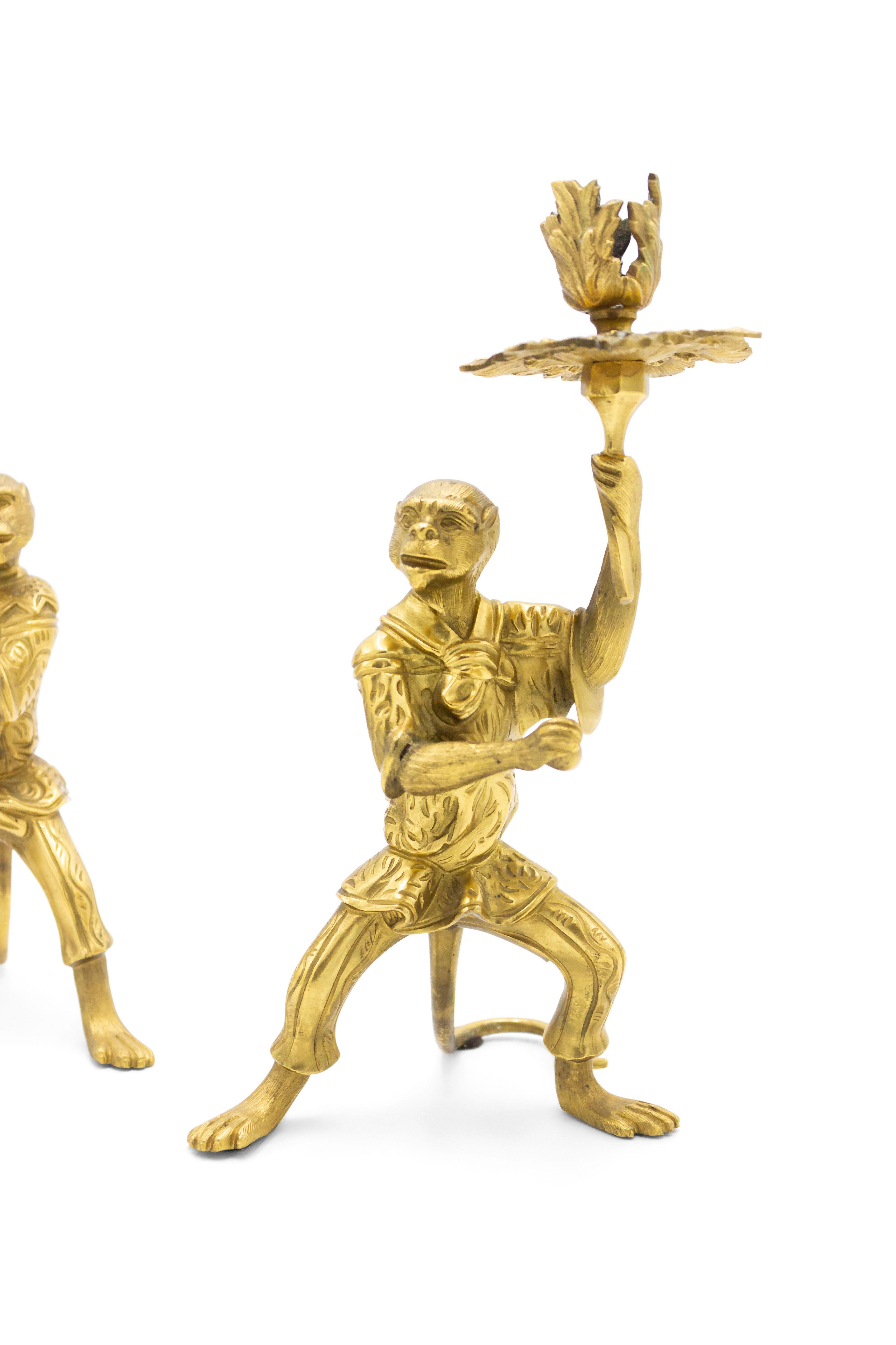 Pair of French XVI-style (20th CentURY) bronze-dore monkey candlesticks (PRICED AS Pair).
 