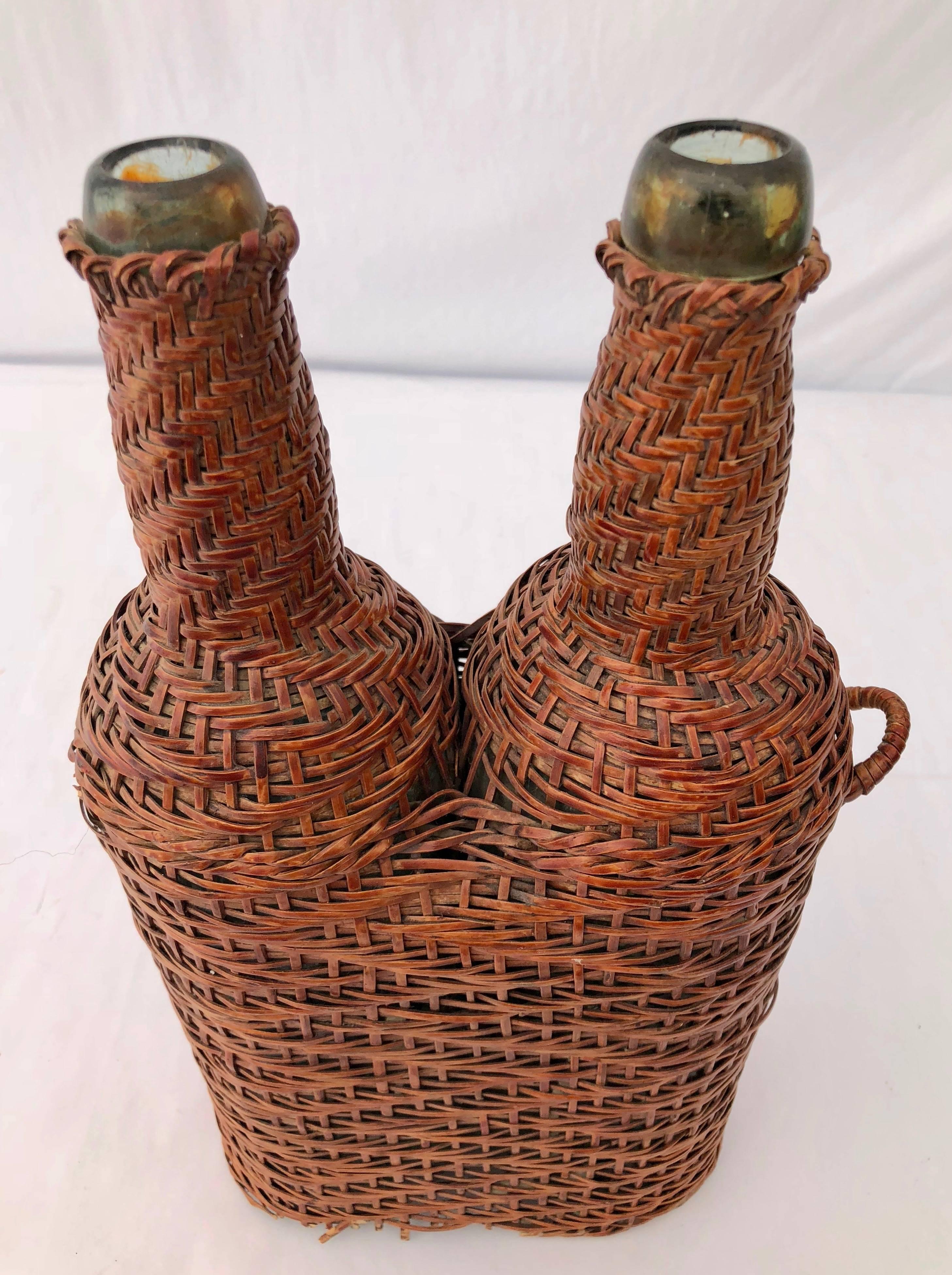 French Hand Blown Bottles Surrounded by Woven Wicker with Detached Handle, Pair In Fair Condition For Sale In Petaluma, CA