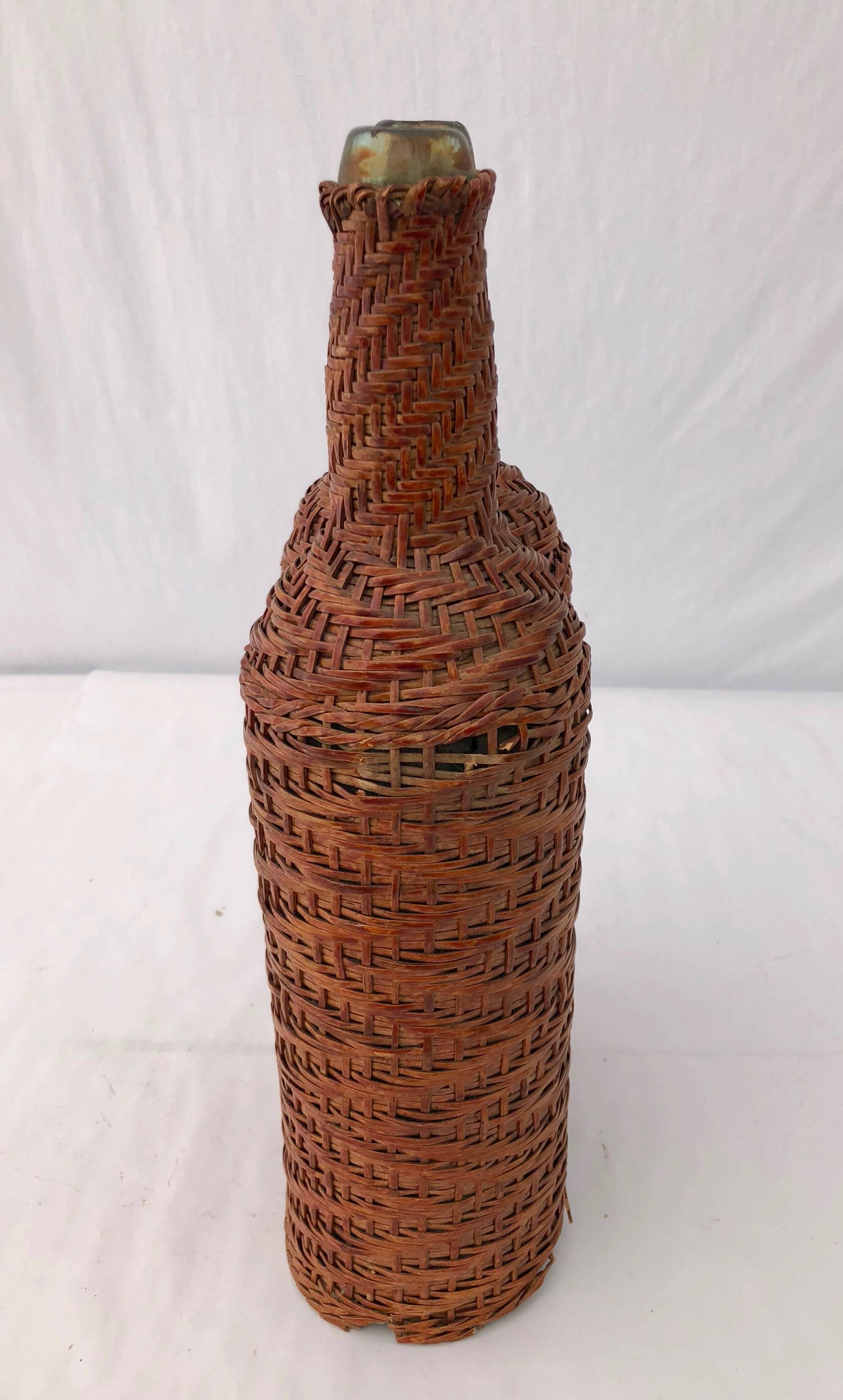 20th Century French Hand Blown Bottles Surrounded by Woven Wicker with Detached Handle, Pair For Sale